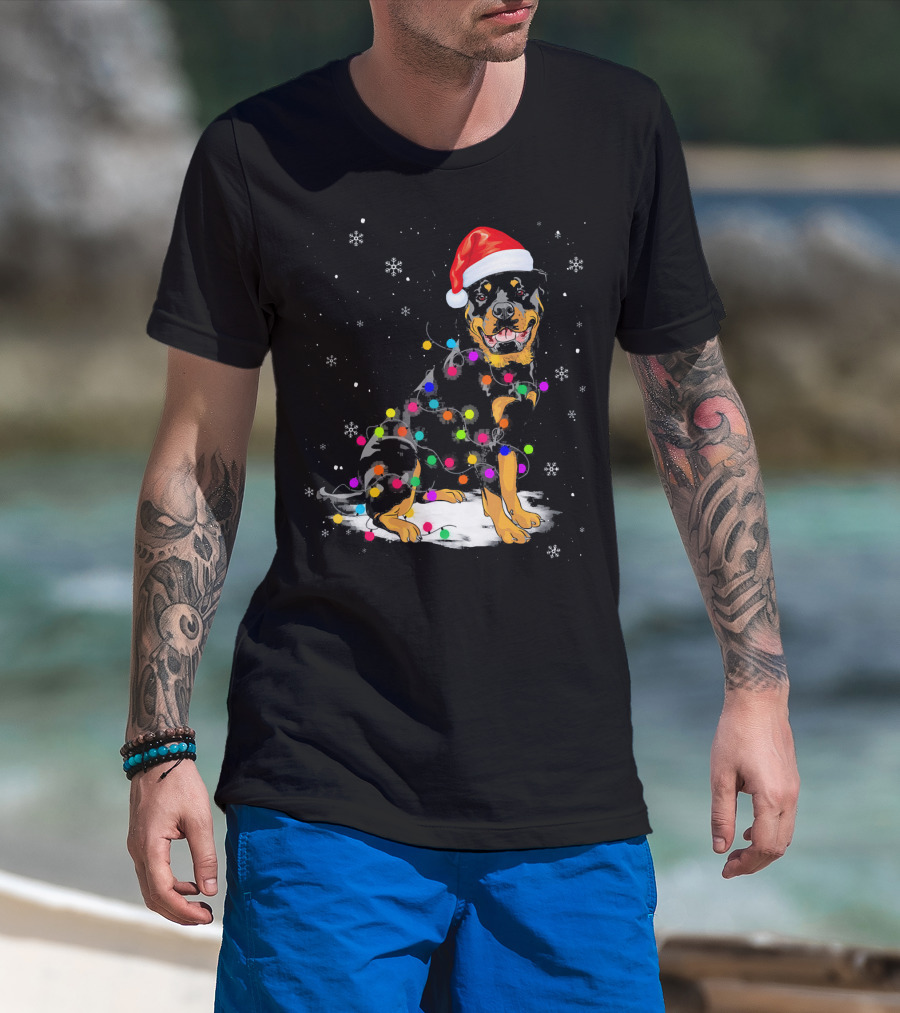 Rottweiler With Santa Hat And Colorful Christmas Lights In Snowy Scene T-Shirt