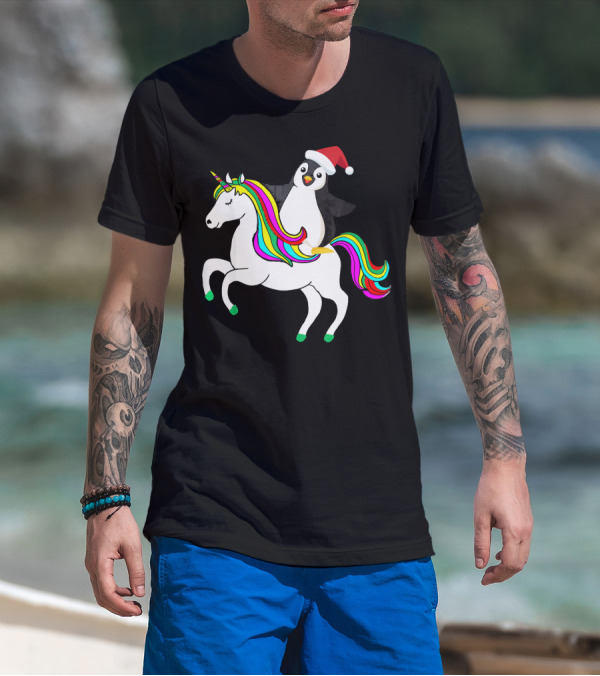 Penguin In Santa Hat Riding A Rainbow Unicorn T-Shirt